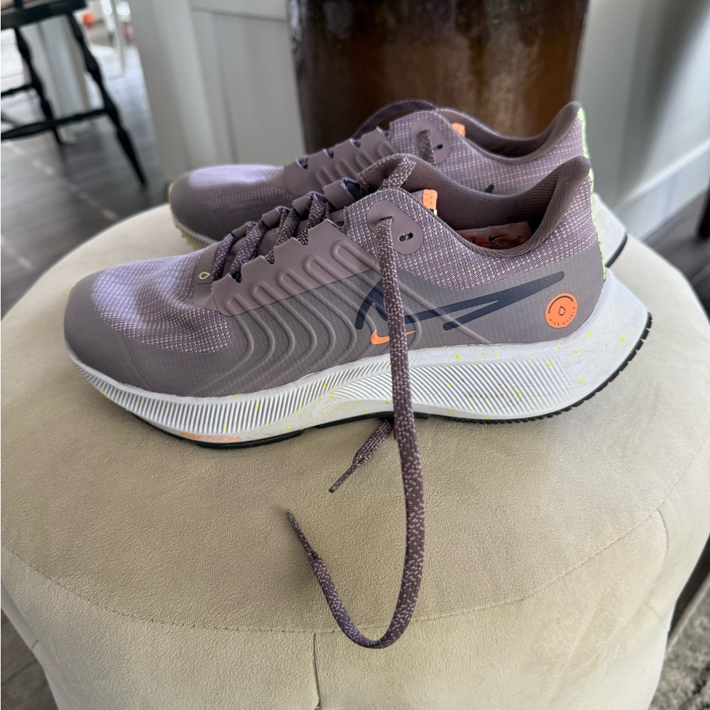 Gray and Orange Nike Zoom